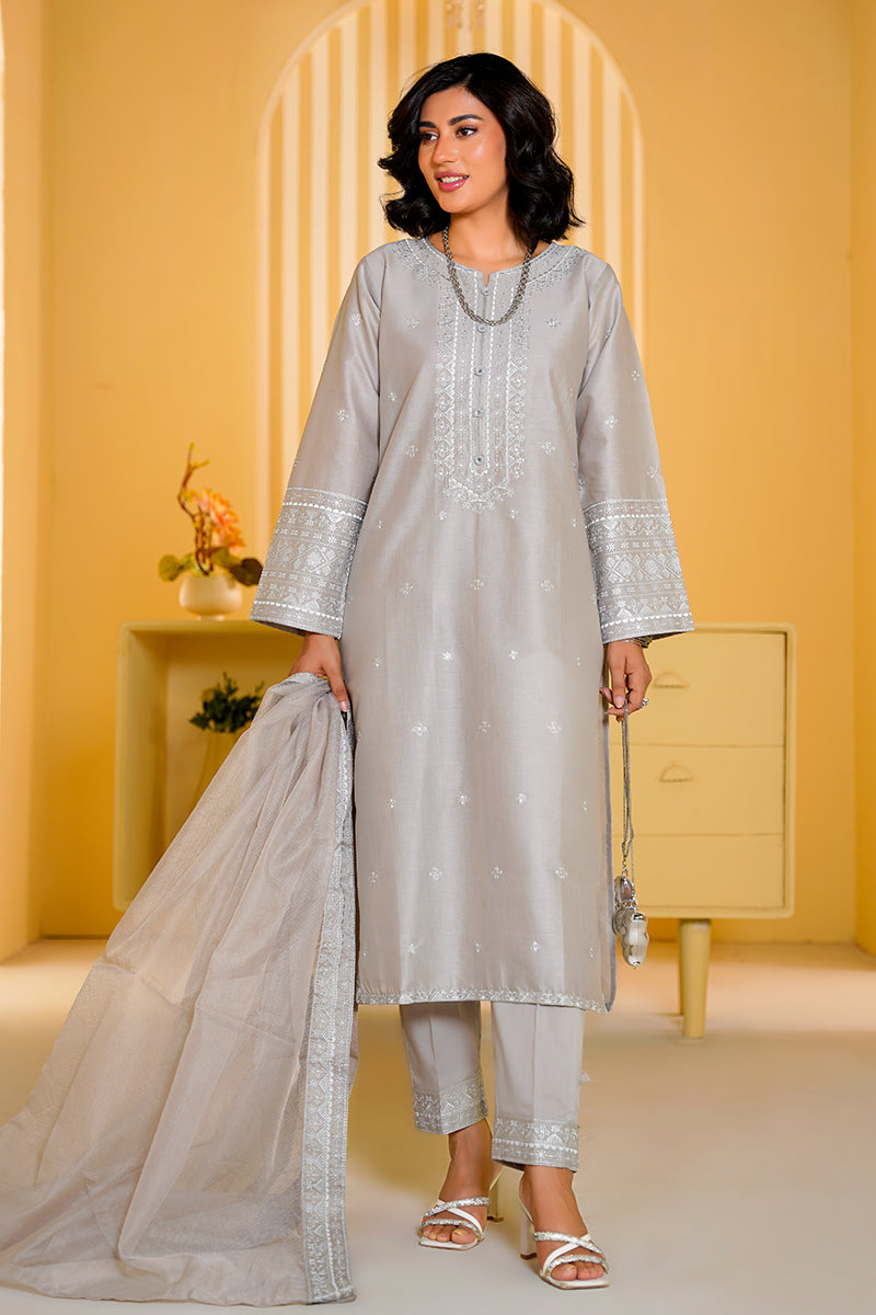 Woman wearing a light gray traditional outfit with a yellow background