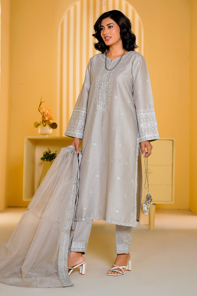 Woman wearing a light gray traditional outfit with a yellow background